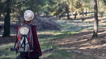  Photograph of a woman walking through the countryside, Granada, Spain.