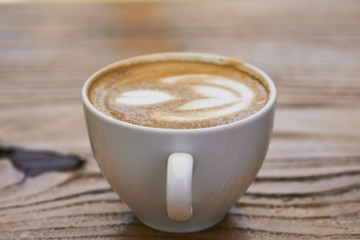 Delicious soft latte coffee on the table