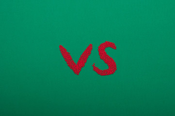 Letters vs with green background and copy space