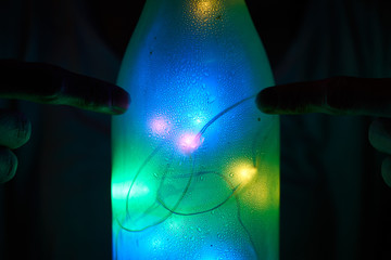 Glass bottle filled with led lights