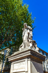 Fototapeta na wymiar Statue of Arts et Sciences at Cours Mirabeau in Aix-en-Provence, France