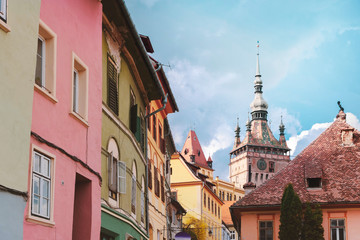 The centre of Sighisoara citadel with the Clock Tower and colorful houses