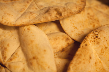 Italian focaccia/pizza near a furnace in a restaurant