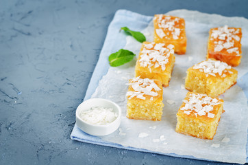 Coconut Breakfast Bars with fresh coconut sprinkles
