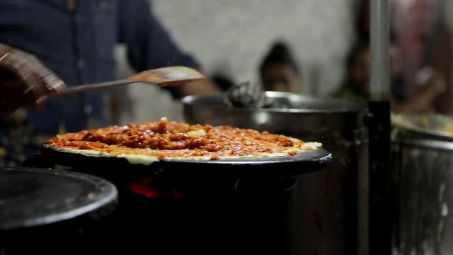 dosa making  video footage on the streets of Mumbai,India