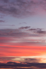 Stunning vivid multiple colors of clouds on a dramatic sunset sky