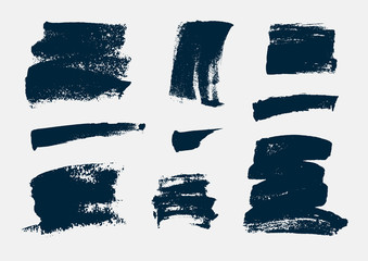 Monochrome abstract vector grunge textures. Set of hand drawn paint brush strokes and stains.