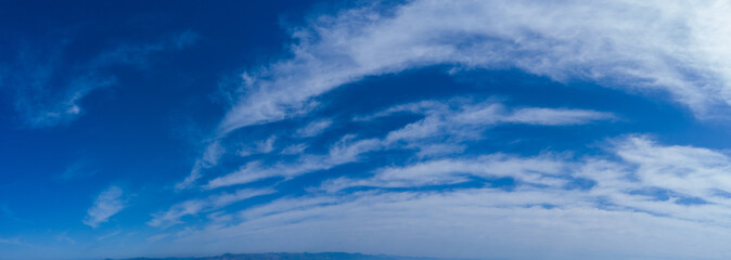 light blue sky with white clouds, panorama