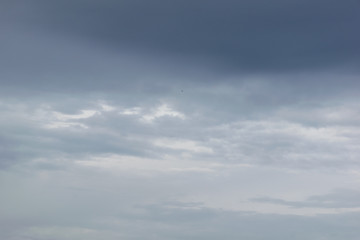 Obraz premium dramatic blue sky with white and gray clouds
