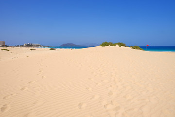 Sand Dunes and beach in National Park Corralejo, Fuerteventura.