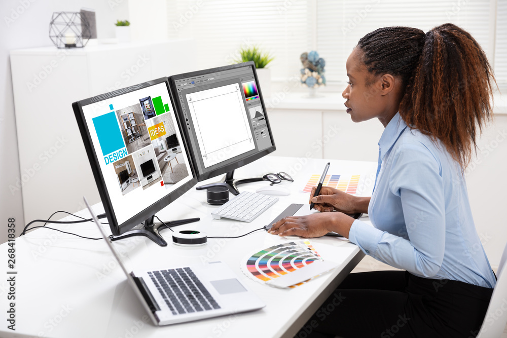 Aufkleber designer editing photos on computer