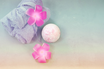Spa setting towels with plumeria flower