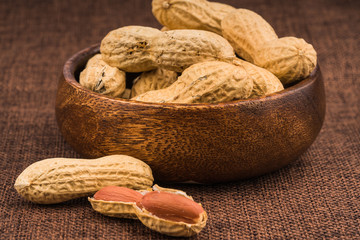 dried  peanuts with shell on white background