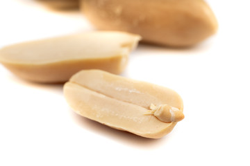 dried  peanuts with shell on white background