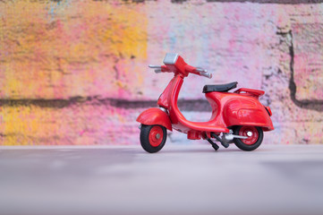 vintage scooter on colorful background