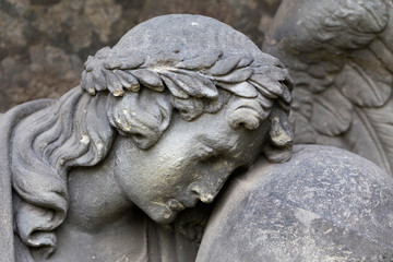 Fototapeta premium Historic Statue on the mystery old Prague Cemetery, Czech Republic