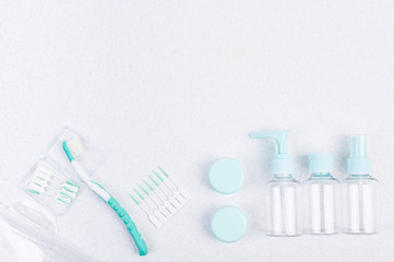 Toothbrush and plastic containers for travel on a white background and chopsticks. Flat lay.