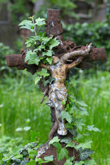 Fototapeta premium Historic Jesus on the mystery old Prague Cemetery, Czech Republic