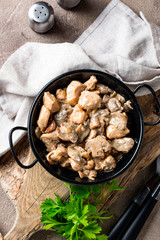 Stewed chicken fillet with mushrooms