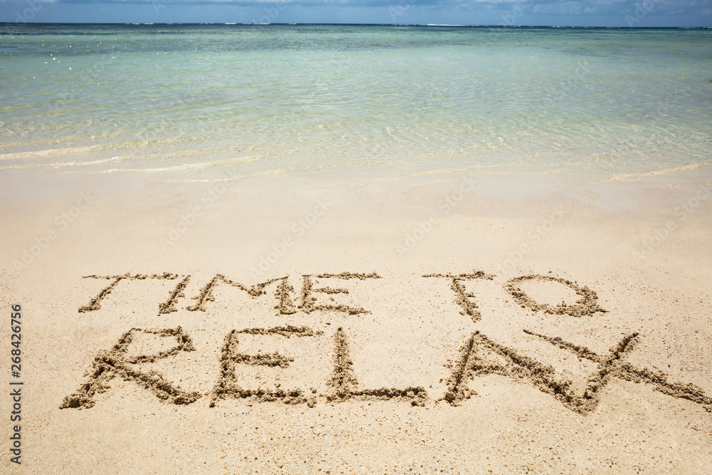 Wall mural time to relax text on sand at beach