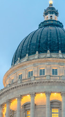 Vertical Dome of Utah State Capital Building with pale blue sky in the background