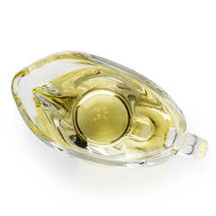 Olive oil in glass jar on white