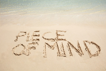 Peace Of Mind Text On Sandy Beach