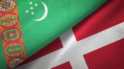 Fototapeta premium Turkmenistan and Denmark two flags textile cloth, fabric texture