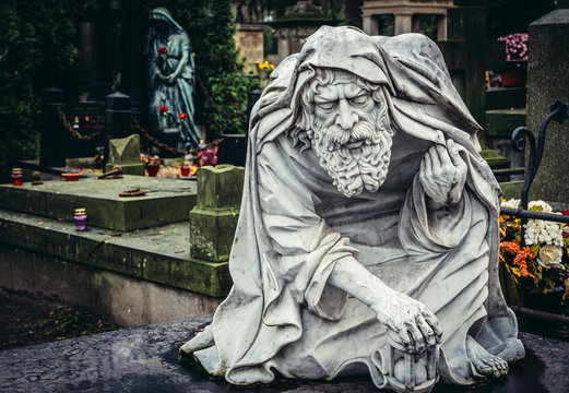 Grave statue on Old Powazki cemetery in Warsaw city, Poland