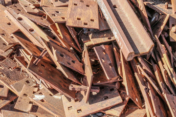 rusty metal pieces in a locomotive junk yard