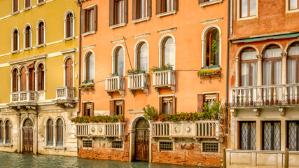 Fototapeta na wymiar VENICE, ITALY - NOVEMBER 11th: Venice, Italy architecture of old buildings along the waterfront of the Grand Canal on November 11th, 2017