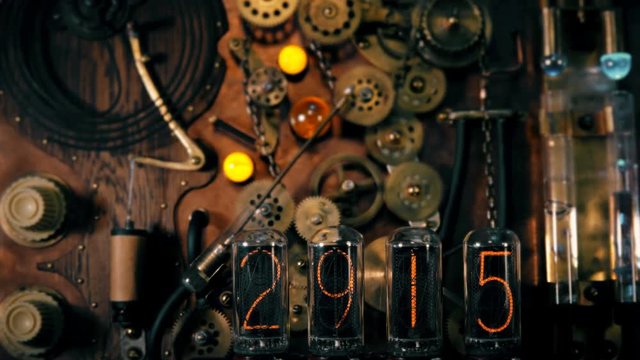 Steampunk, the device is a time machine with randomly running numbers and stop at the end of 2019, backlit, many different gears that rotate, the pendulum beats off seconds and in flasks with liquid