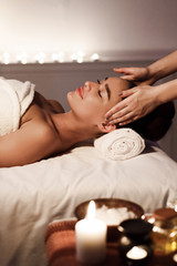 Obraz na płótnie Canvas Spa Treatments. Woman Enjoying Face Massage In Spa
