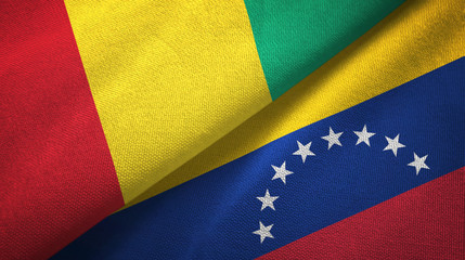 Guinea and Venezuela two flags textile cloth, fabric texture