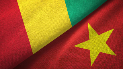 Guinea and Vietnam two flags textile cloth, fabric texture