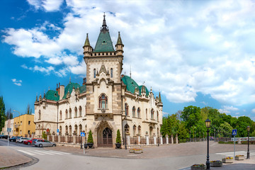 Fototapeta na wymiar View of neo-gothic Jakab palace with emerald green roof in Old town in Kosice (SLOVAKIA)