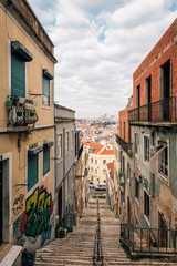 Fototapeta na wymiar Staircase and old buildings in Lisbon, Portugal