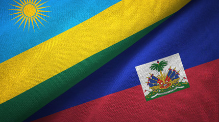 Fototapeta premium Rwanda and Haiti two flags textile cloth, fabric texture