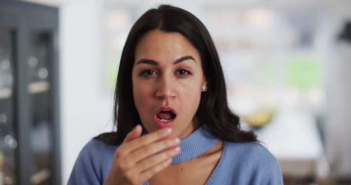 4K Close up beautiful young woman yawning with exaggeration