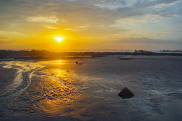 Fototapeta na wymiar Couché de soleil sur la plage de Santa Teresa au Costa Rica