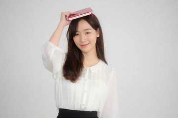 portrait of thai china adult office girl white shirt reading red book