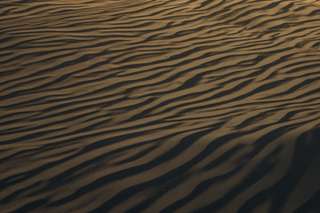 3d rendering, the wide desert, with stripes shapes.