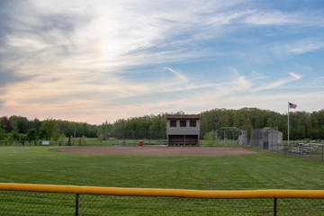 Fototapeta na wymiar Baseball field from an outfield behind the third base line prospective