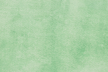 green watercolor painted on paper  background texture macro