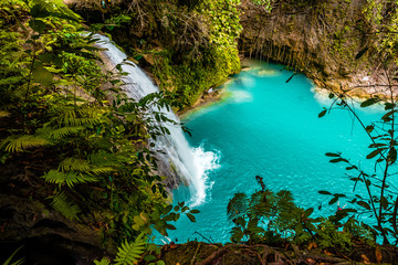 Kawasan Falls on Cebu island in Philippines, turquoise waterfalls