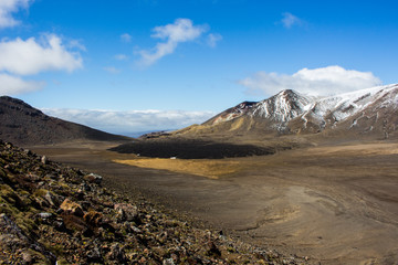 Lava field in Tongariro National Park and Mount Doom in background, lord of the ring trilogy, north...
