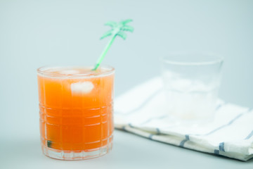 Homemade peach mix soda with ice cubes