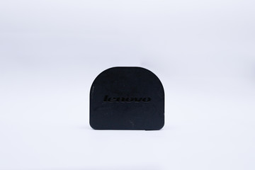 Black USB charger head/adapter isolated on a white background