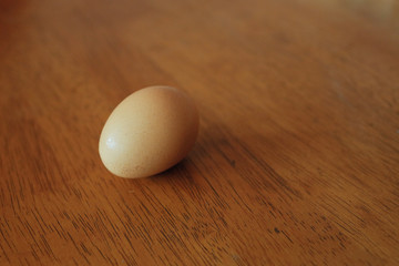 Eggs on wooden table background, shot from a 45 degree angle, with rule of third