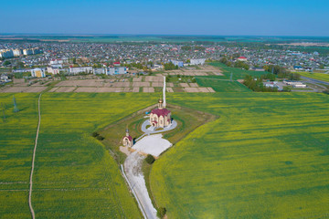 View of the Church of the Holy New Martyrs and Confessors of the Land of Belarus in the city of Skidel (aerial photography). Belarus